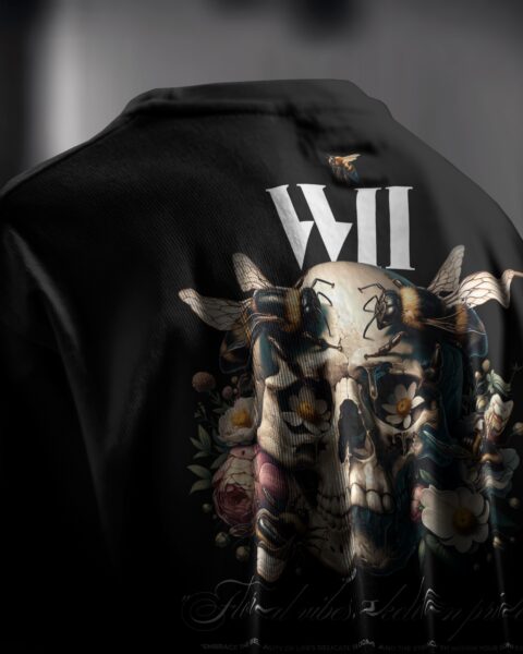 Black hoodie with a graphic design of a tattooed skull and roses on the back, featuring the number '11'.