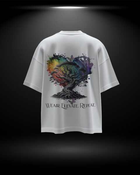 White t-shirt with a colorful tree design and text on the back against a dark background