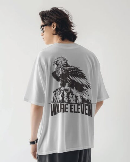 Person wearing a white t-shirt with an eagle graphic and 'WARE ELEVEN' text on the back.